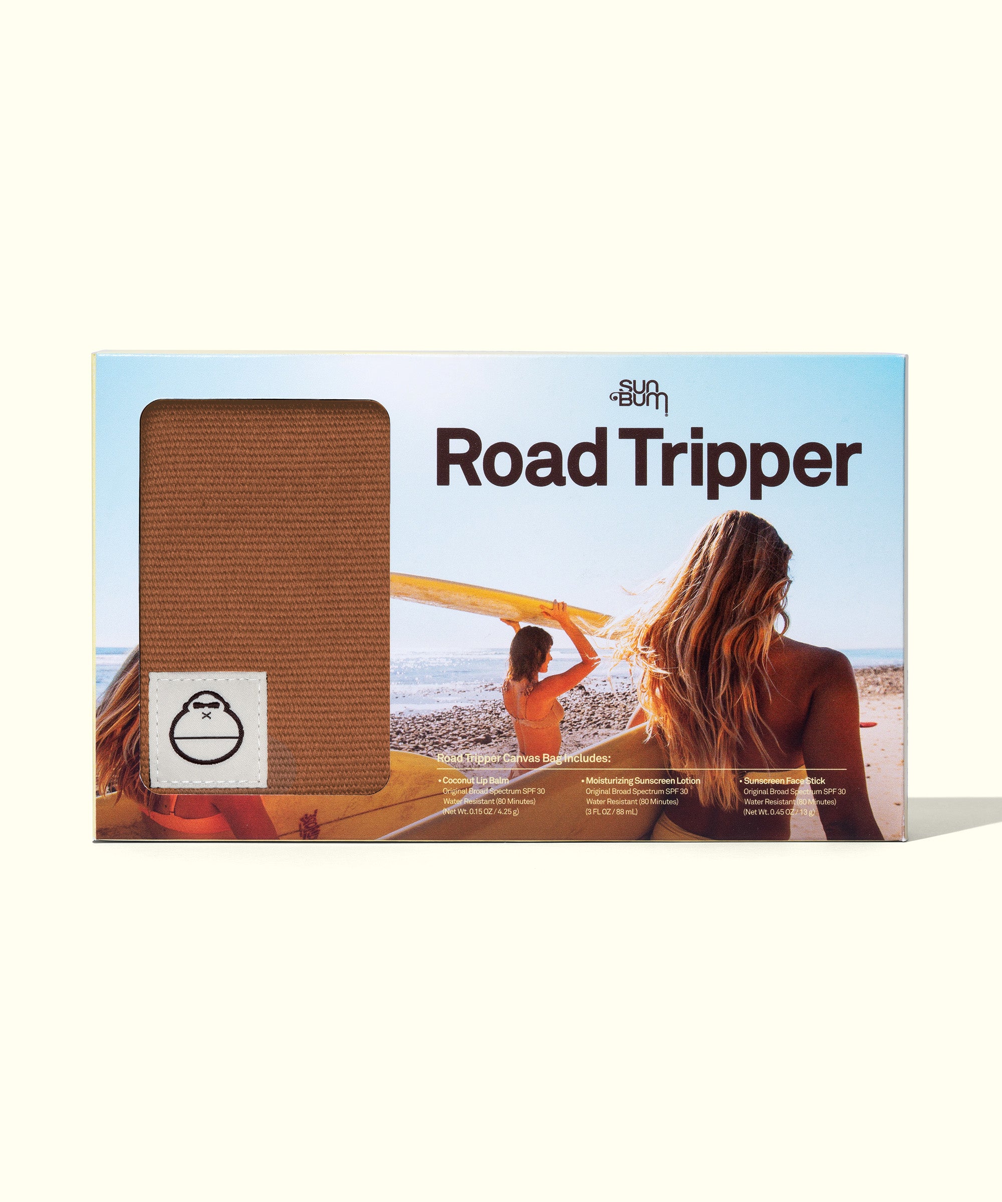 Beach essentials travel kit Road Tripper package with coastal beach scene background - Sun Bum