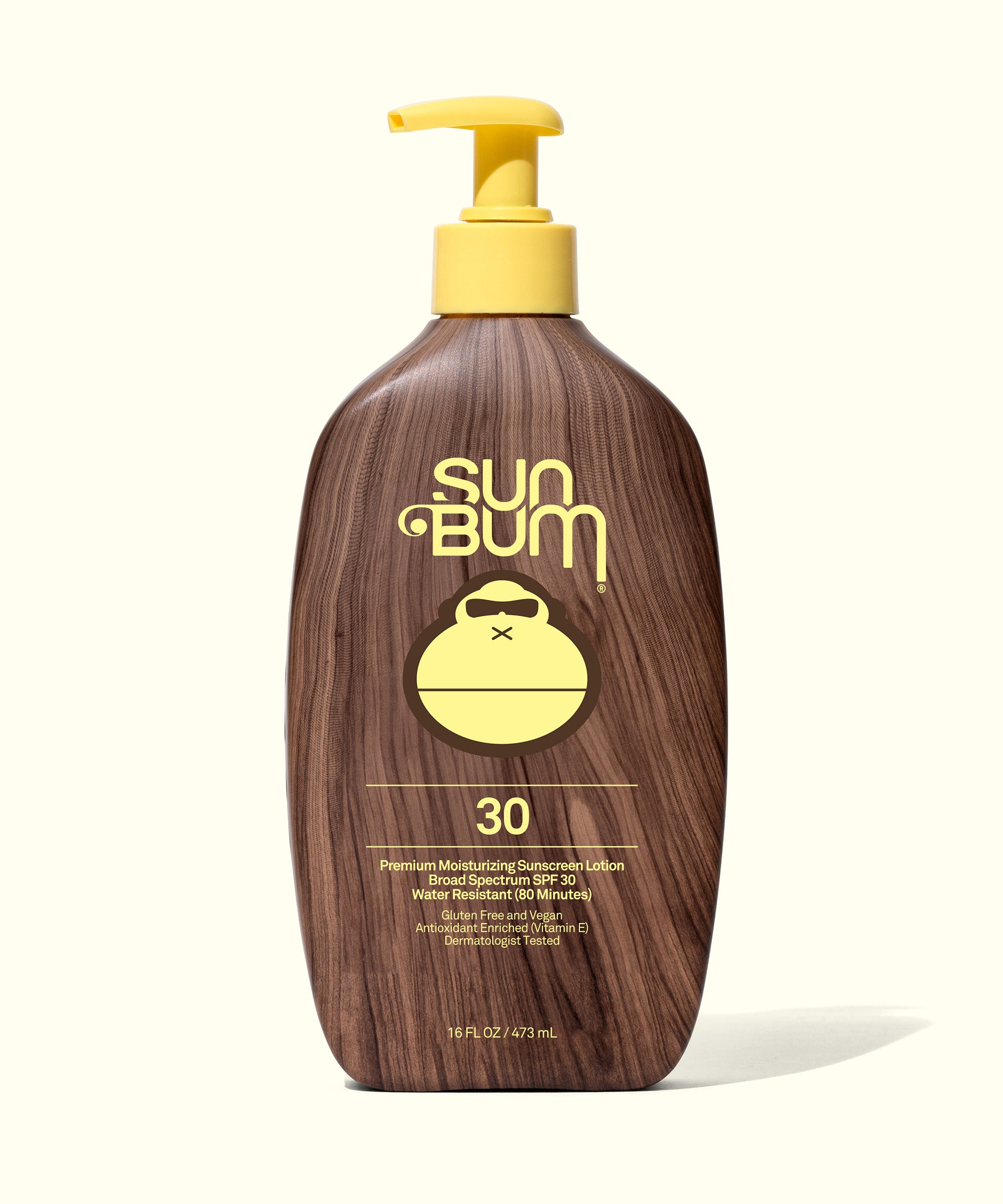 Bottle of Original SPF 30 Sunscreen Lotion with a yellow pump, wood-grain design, and Sun Bum logo.