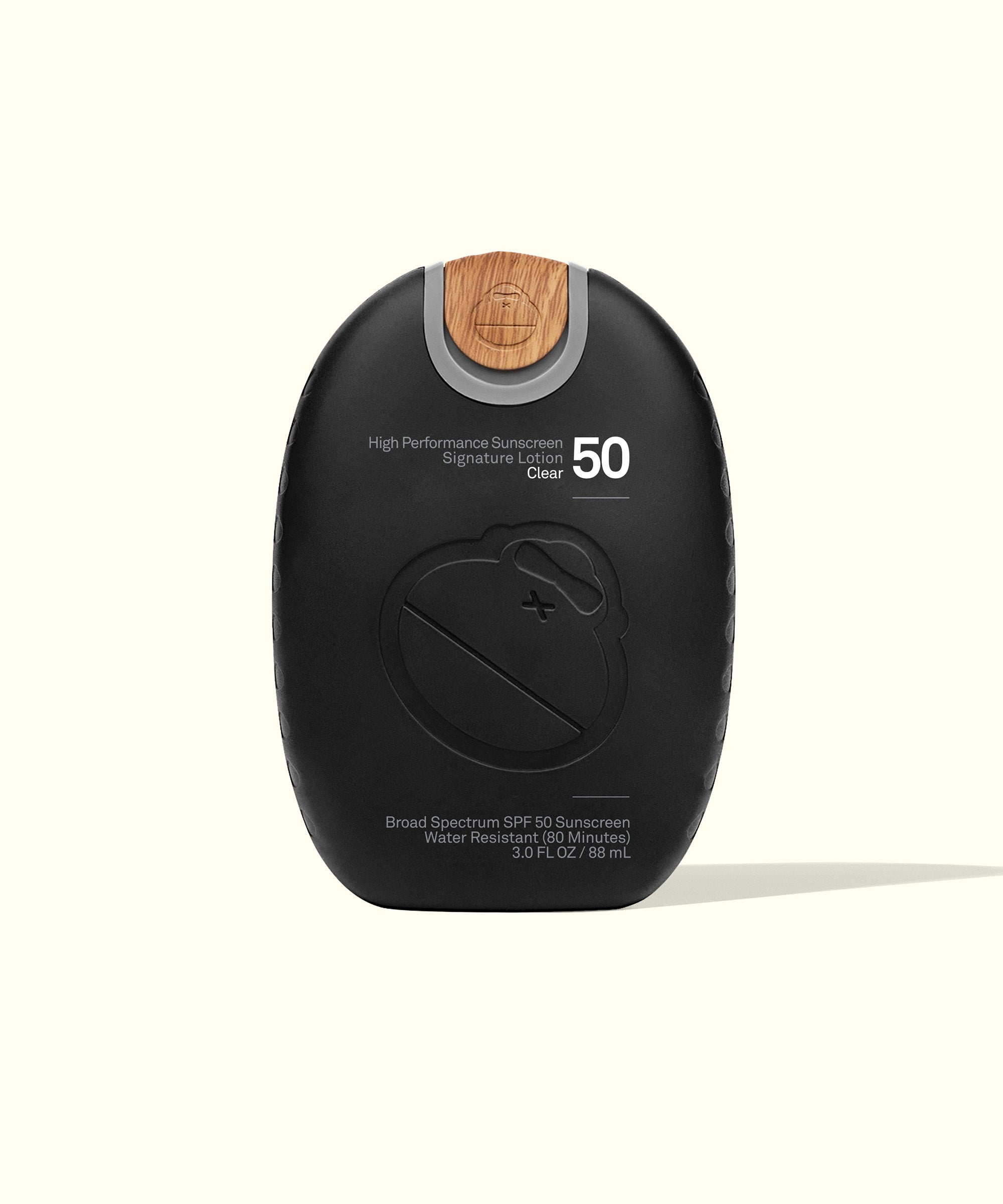 Signature SPF 50 Sunscreen Lotion | Mineral-based, Broad Spectrum protection, non-greasy, water-resistant formula in a sleek black bottle with wooden accent | Sun Bum