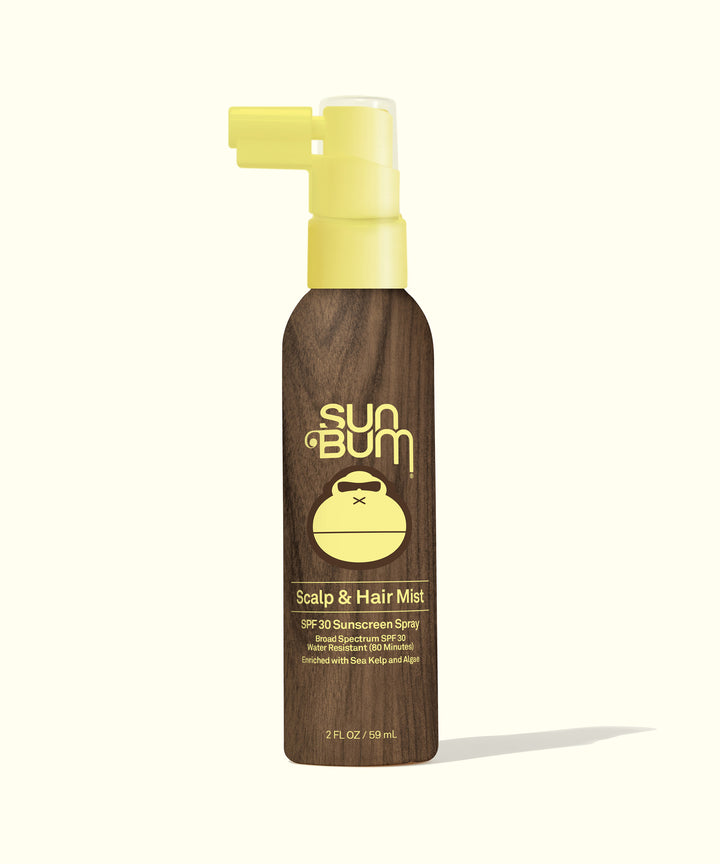 Scalp & Hair Mist SPF 30 in a sleek brown spray bottle with a yellow cap, designed for lightweight, fast-drying protection that keeps hair grease-free. Sun Bum,