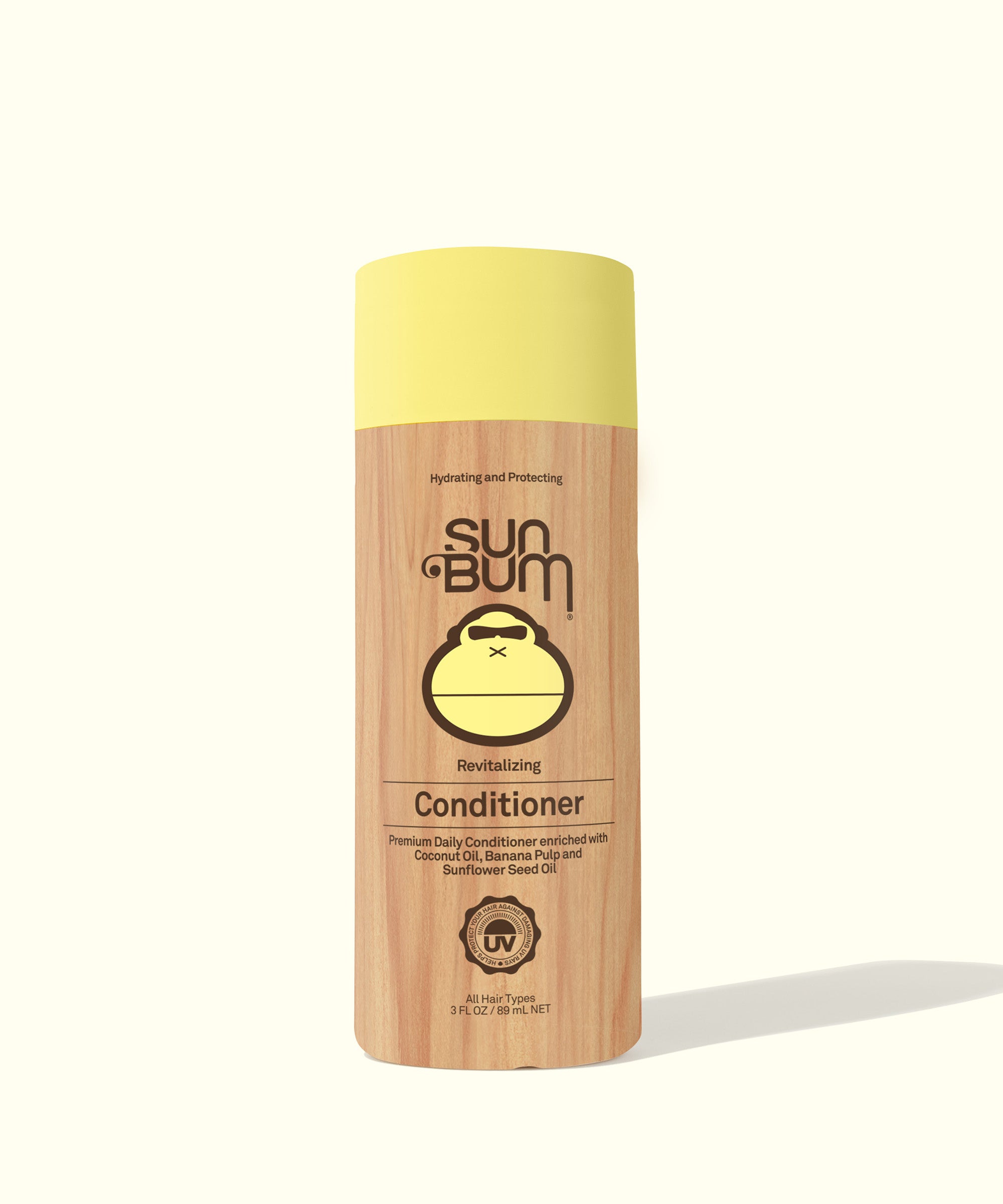Revitalizing Conditioner by Sun Bum, enriched with Coconut Oil, Banana, and Sunflower Seed Oil for smooth, healthy-looking hair.