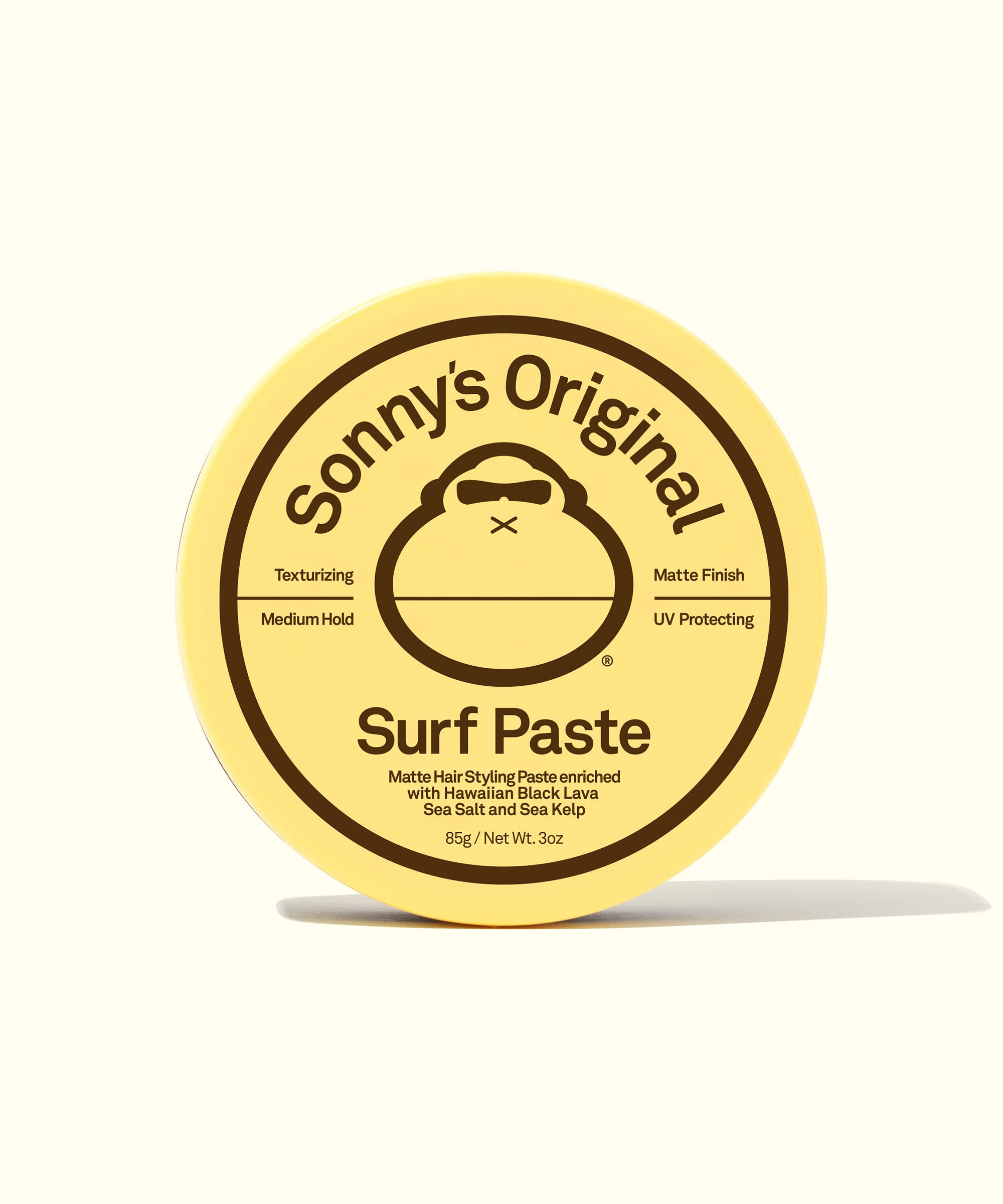 Sonny's Original Texturizing Surf Paste in a round yellow container with matte finish, medium hold, and UV protection. Sun Bum,