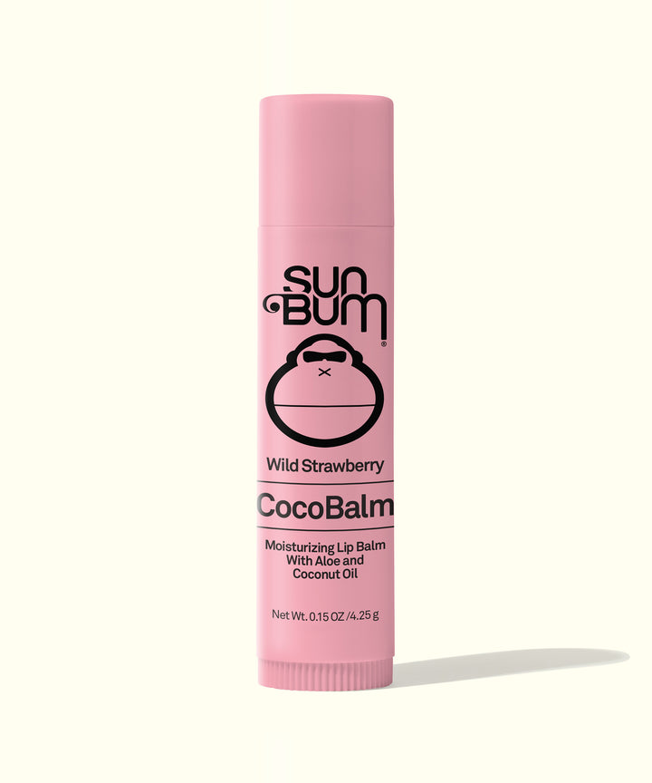 Pink tube of CocoBalm Lip Balm in Wild Strawberry flavor by Sun Bum.