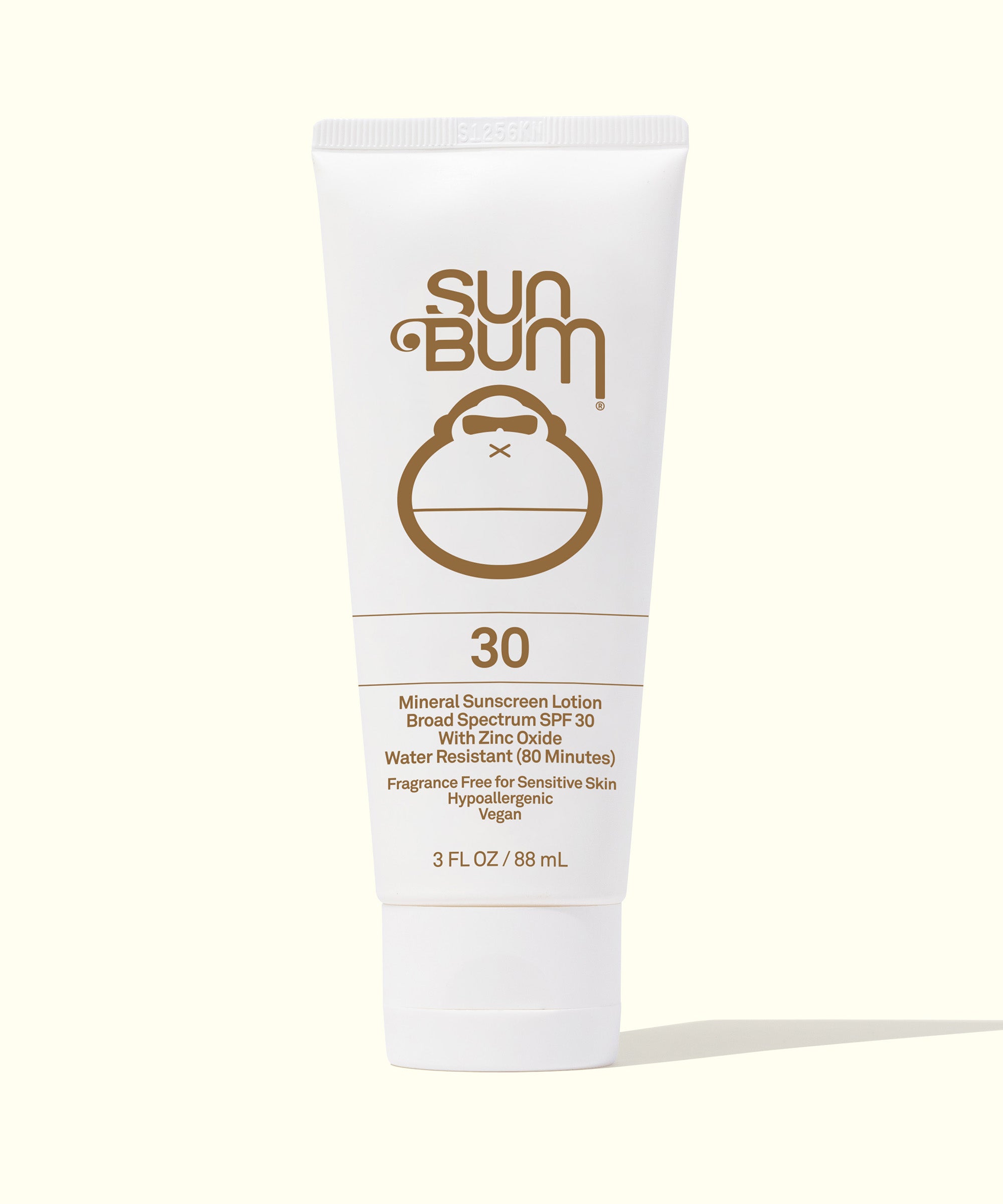 Mineral SPF 30 Sunscreen Lotion with zinc, fragrance-free, and broad-spectrum protection in a white tube by Sun Bum.