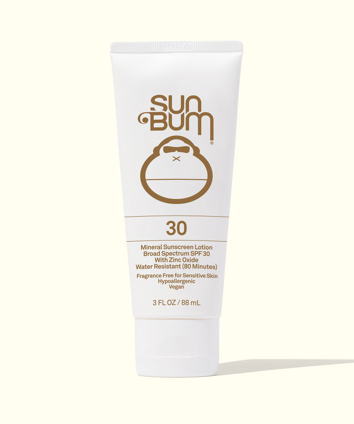 Mineral SPF 30 Sunscreen Lotion with zinc, fragrance-free, and broad-spectrum protection in a white tube by Sun Bum.
