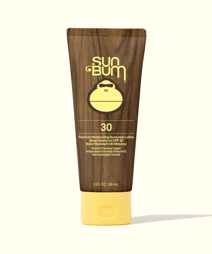 Original SPF 30 Sunscreen Lotion by Sun Bum, featuring a wood-textured bottle with a cheerful yellow cap, perfect for premium sun protection and moisturizing.
