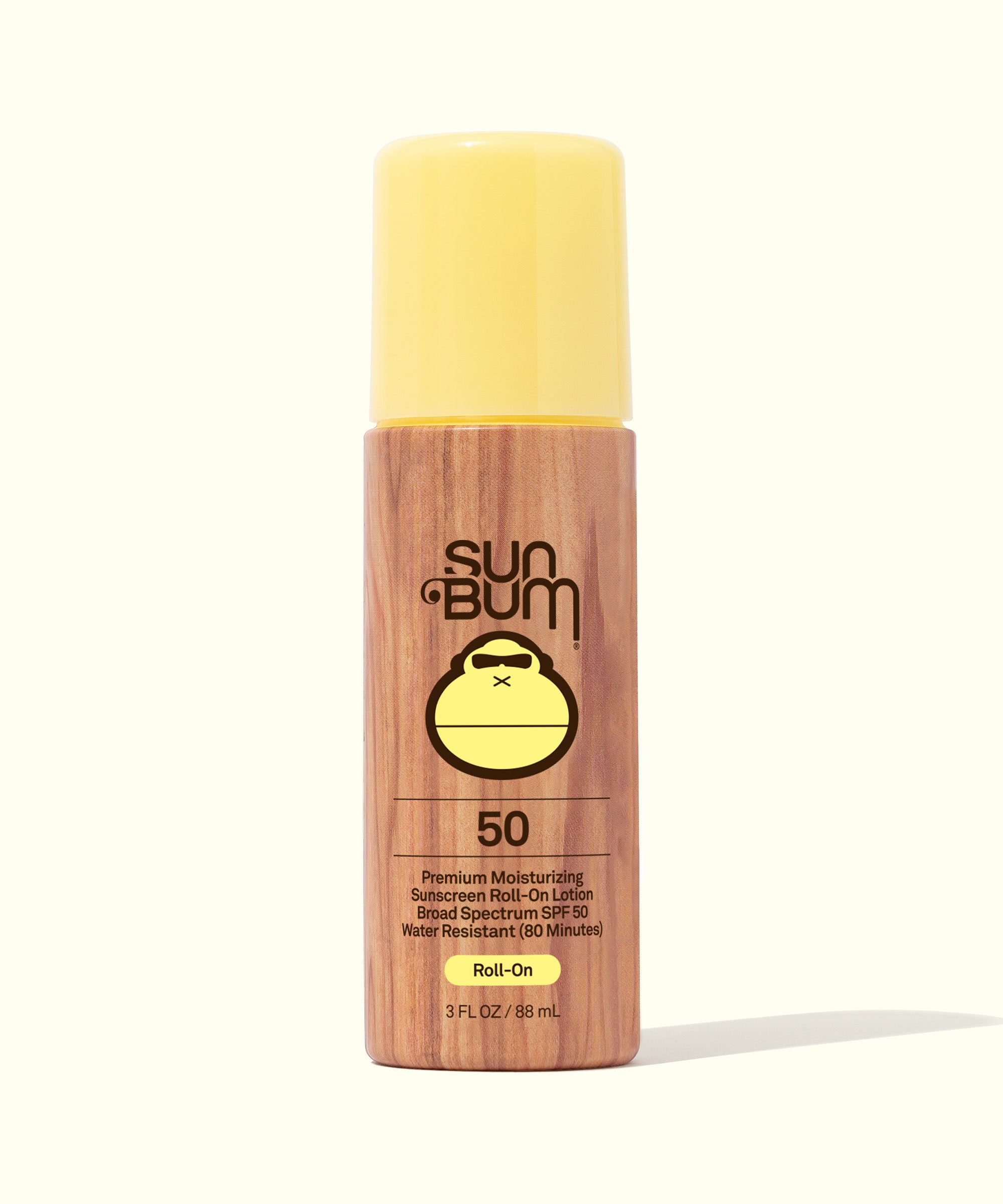 Original SPF 50 Sunscreen Roll-On Lotion bottle, yellow cap and wooden finish for quick sun protection, Sun Bum.