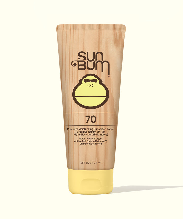 Original SPF 70 Sunscreen Lotion tube with yellow cap, branded with the friendly Sun Bum monkey logo. Sun Bum