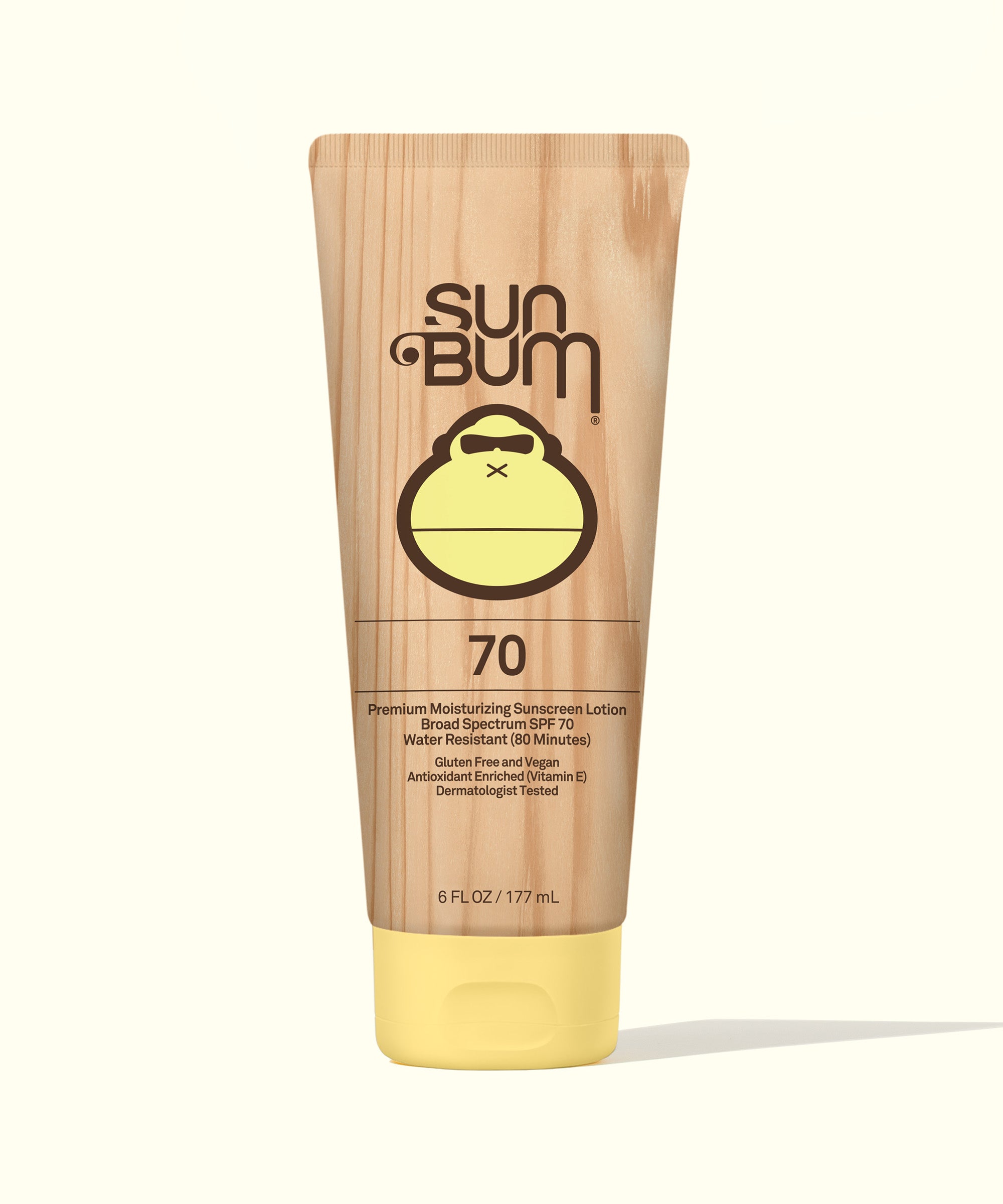 Original SPF 70 Sunscreen Lotion tube with yellow cap, branded with the friendly Sun Bum monkey logo. Sun Bum