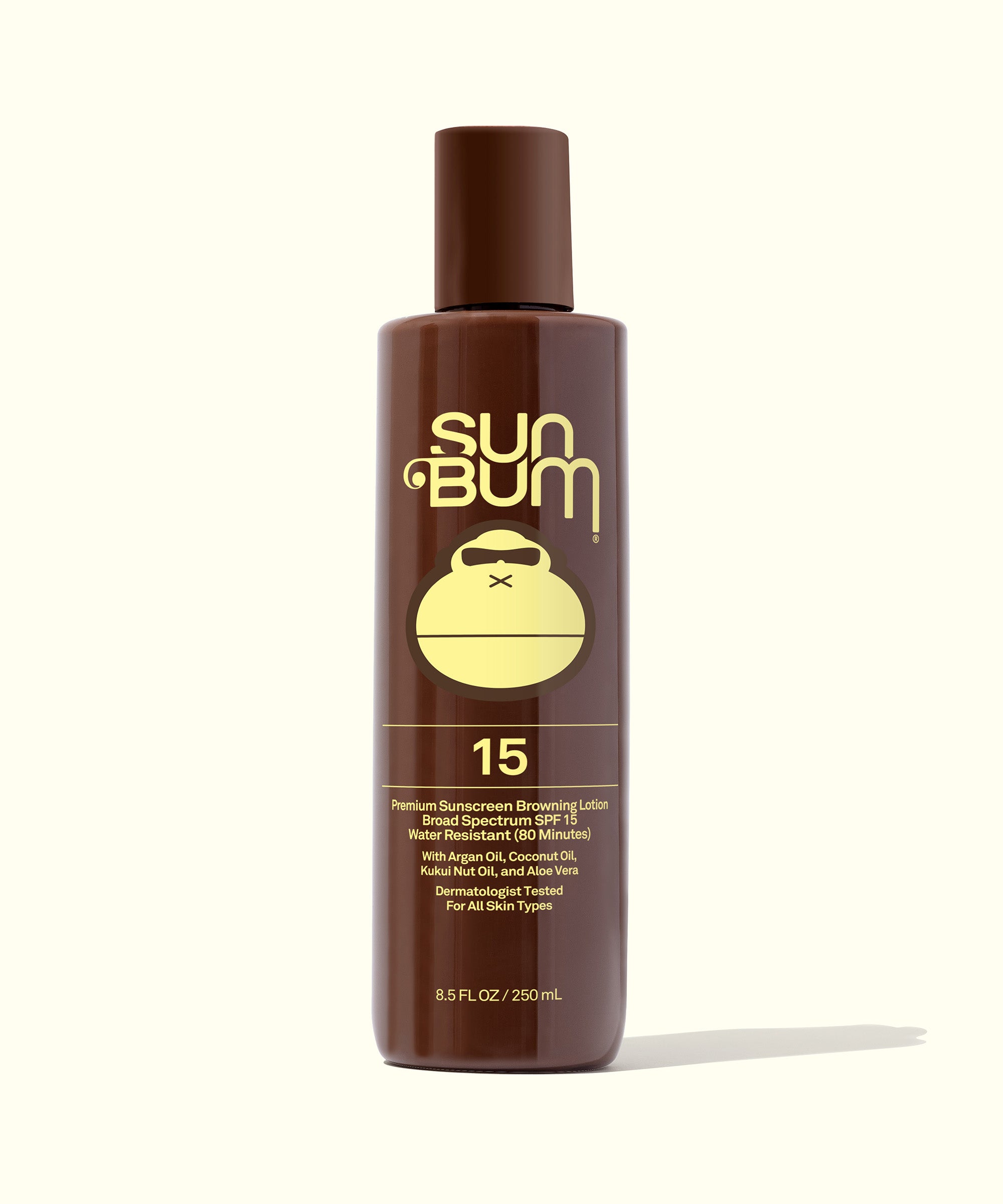 Bottle of SPF 15 Sunscreen Browning Lotion with coconut and argan oil, designed for golden, glowy skin, Sun Bum