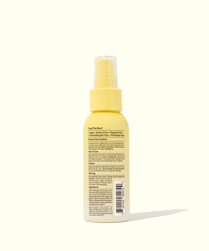 Yellow bottle of Blonde Hair Lightener spray with text instructions on the back, helps brighten hair using Costa Rican Pineapples and Meyer Lemons, Sun Bum.