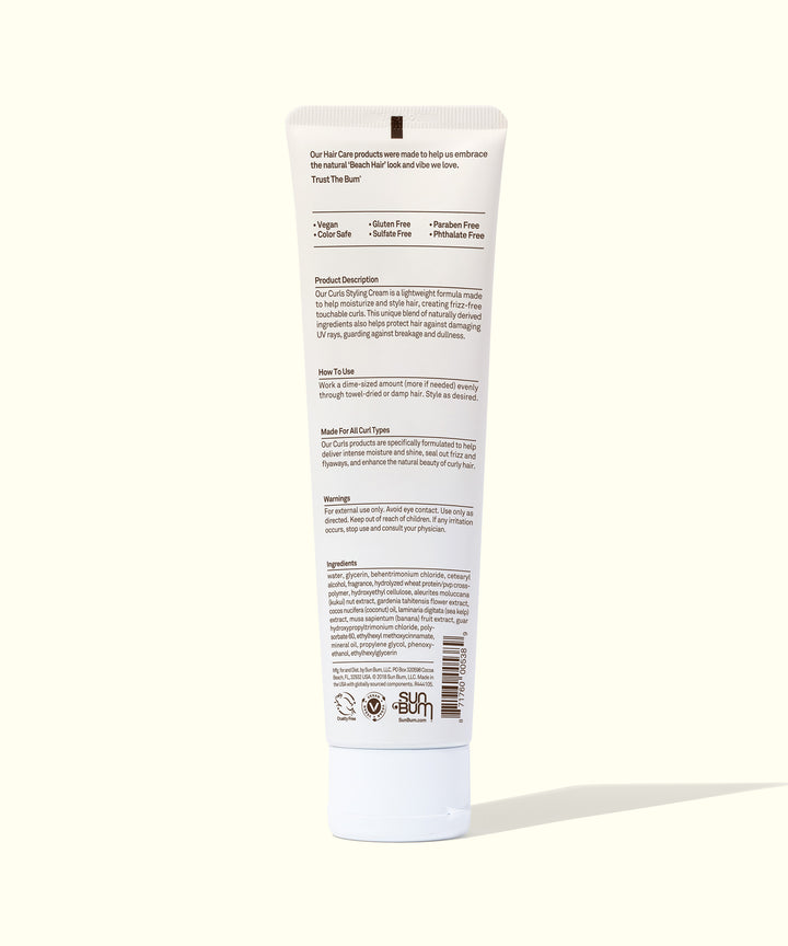 Back view of the Curls Styling Cream product tube featuring nourishing Kukui Nut Oil and Monoi Coconut Oil for soft, crunch-free curls. Sun Bum.