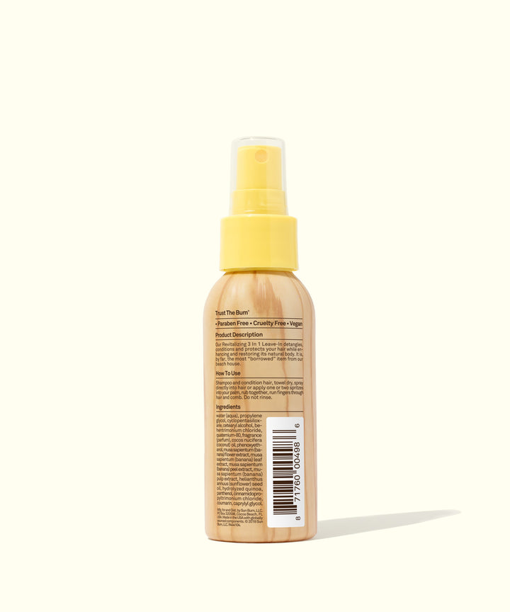Back view of a 3 In 1 Leave In conditioning spray bottle with a yellow cap, from Sun Bum.