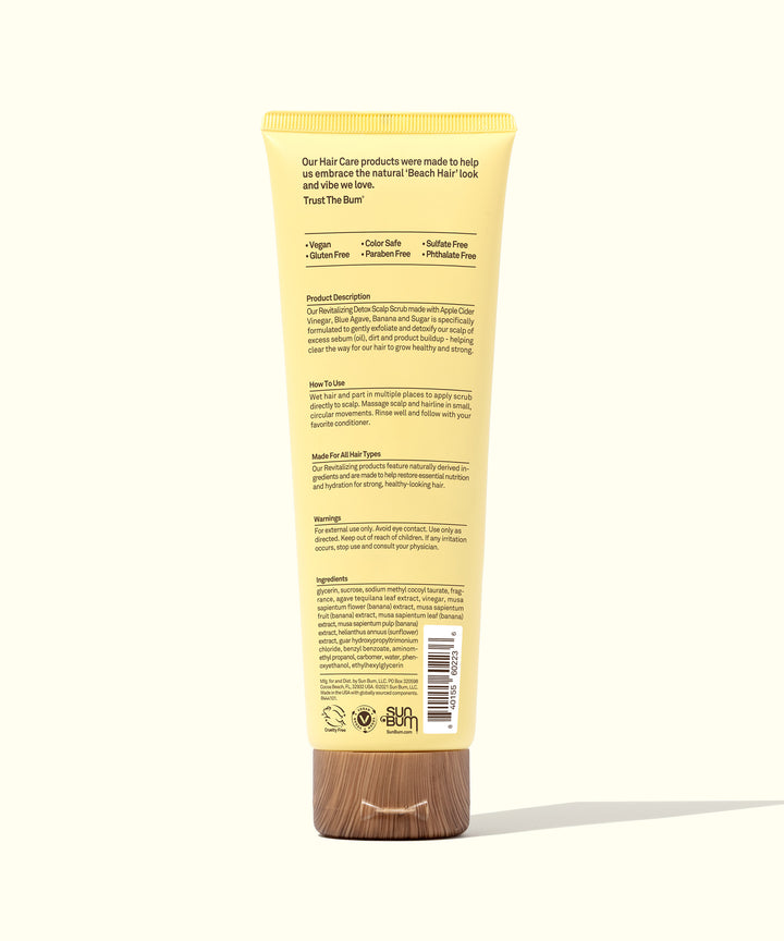 Back view of a yellow tube of Revitalizing Detox Scalp Scrub by Sun Bum, highlighting product ingredients and benefits.