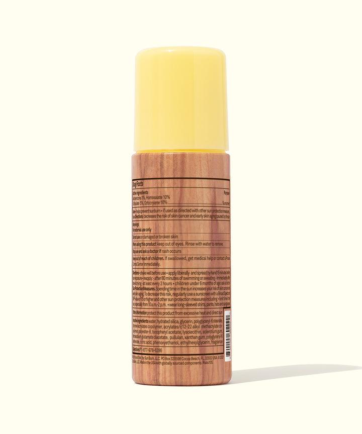Back view of the Original SPF 50 Sunscreen Roll-On Lotion with a yellow cap, showing product information, perfect for quick and easy sun protection from Sun Bum.