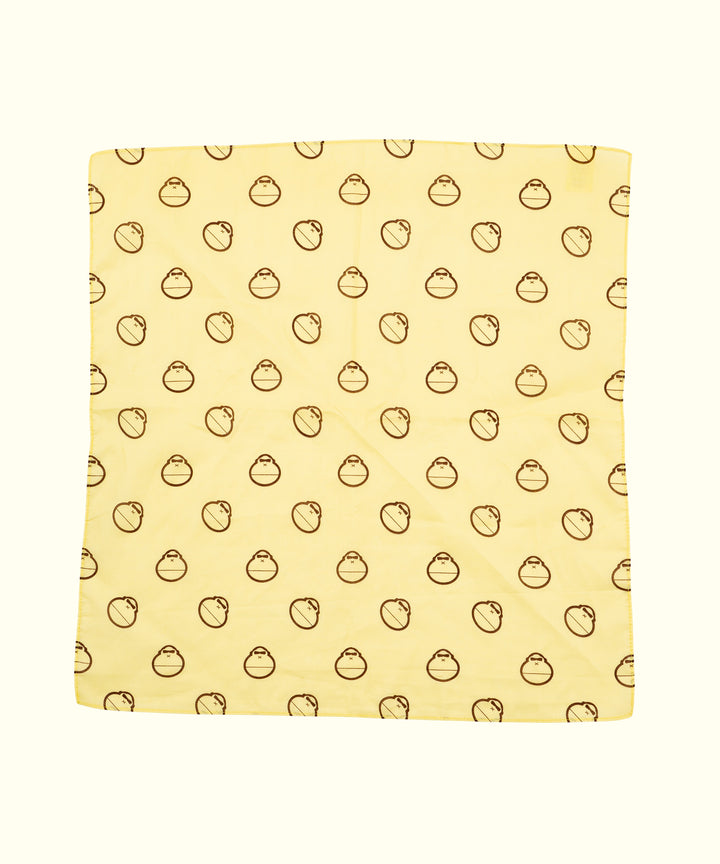 Light yellow Sonny Bandana featuring an all-over pattern of small, brown smiling suns, ideal for headbands, neck wraps, or even a handy cloth. Sun Bum,