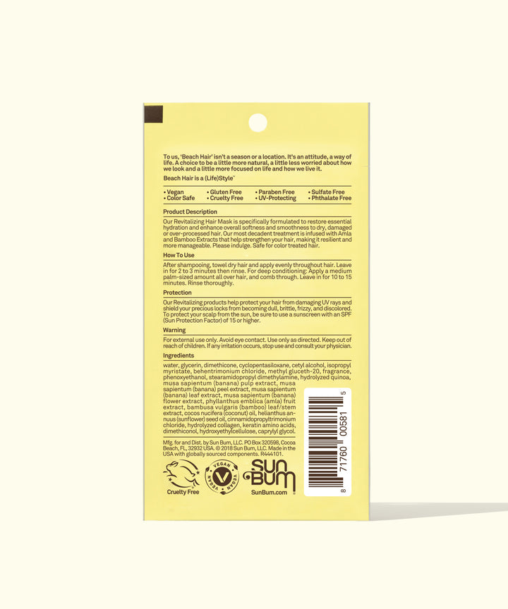 Yellow product label for Revitalizing Hair Mask showing detailed ingredient list, usage instructions, and warnings on a textured background. Features product benefits for damaged hair and Sun Bum branding with vegan certification logos at bottom - Sun Bum