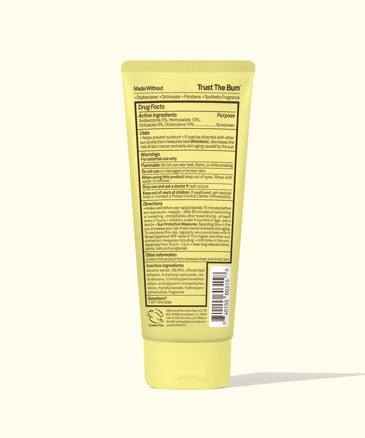 Back view of a yellow tube of Kids SPF 50 Clear Sunscreen Lotion with detailed product information and ingredients listed, Sun Bum.
