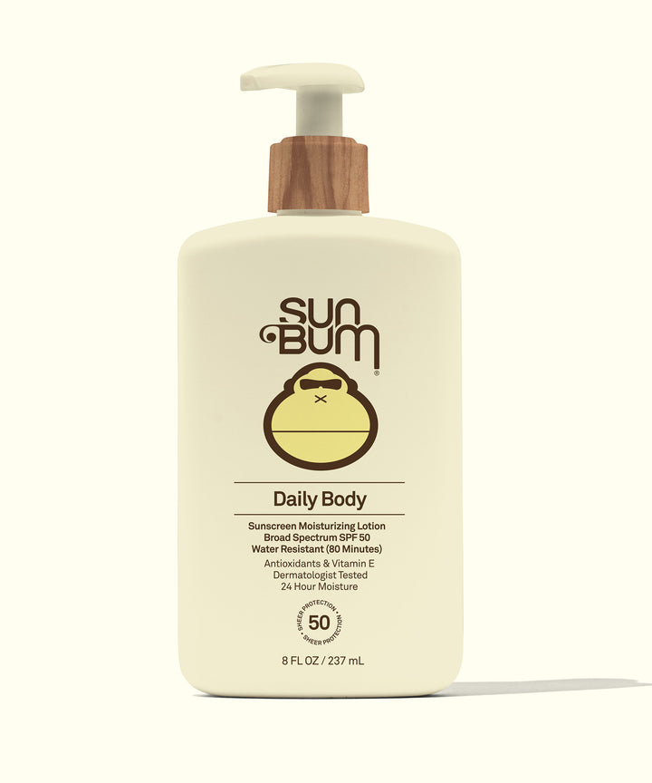 Sun Bum Daily Body SPF 50 lotion bottle with pump dispenser, featuring brand logo and product details on cream-colored background. Moisturizing sunscreen for everyday protection. Sun Bum